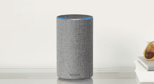 A grey speaker on a table